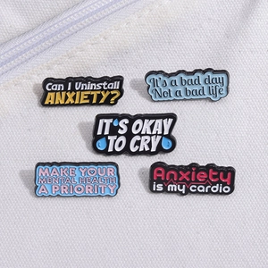 Five-piece mental health enamel pin set with motivational quotes on white canvas background