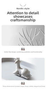Detail view of the elegant antler structure on a Nordic style white deer jewelry organizer