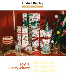 Close-up of vintage Christmas wrapping paper set with festive ribbons and reindeer patterns