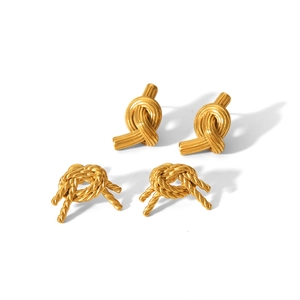 Exaggerated 14k gold plated stainless steel knot stud earrings in glossy and rope textures