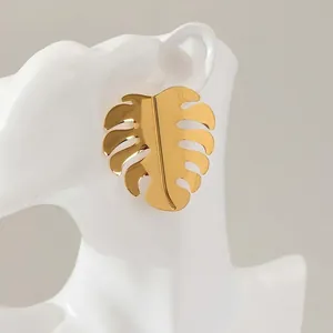 Polished 18K gold monstera leaf earrings for women made of premium stainless steel
