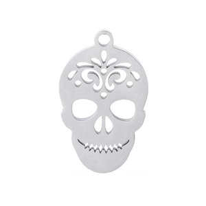 Macro view of silver punk hollow skull pendant in stainless steel with metallic luster
