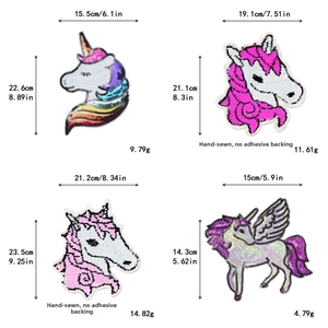 Detailed view of hand-sewn unicorn sequin patches in various sizes without adhesive backing