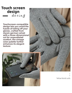 Detail view of grey touch screen gloves made of soft thermal knit fabric for winter