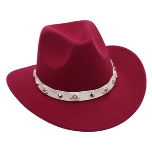 Detail of red felt cowboy hat with white PU band, decorative pearls and silver metal rivets