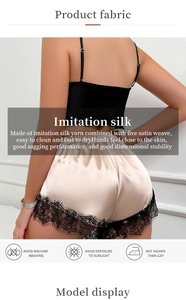 Detail of imitation silk camisole set with black eyelash lace trim and satin texture