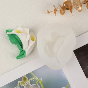 Detailed close-up of Calla Lily silicone mold and finished plaster resin flower sculpture