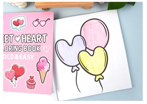 Close-up of Sweet Heart coloring book for kids with thick outlines and cute dessert patterns