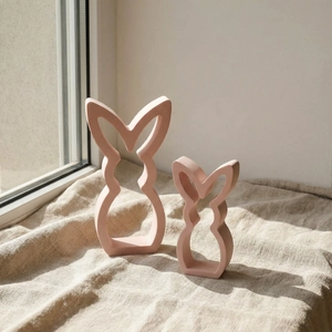 Statues de lapin creuses roses minimalistes en résine mate pour décoration de Pâques