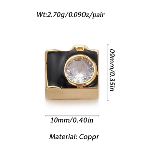 Charm a forma di fotocamera dorata con smalto nero e cristallo di zirconia cubica