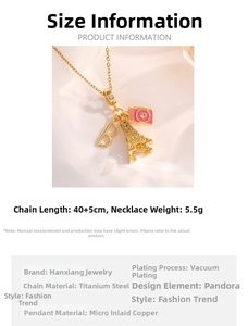 Detail showing gold chain with Eiffel Tower, glasses and camera pendants, 40+5cm length
