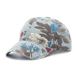 Detailed view of the vintage floral print and premium denim fabric on the baseball cap