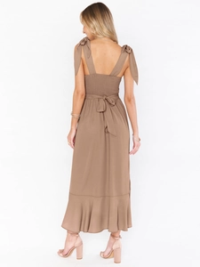Detail of mocha midi dress featuring smocked back and adjustable bow shoulder straps