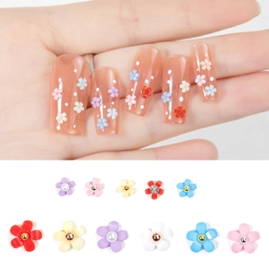 DIY 3D floral nail art charms with colorful flowers and pearls for manicure decoration
