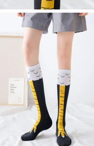 Funny chicken feet patterned over-the-knee socks in black with yellow knitted bird legs