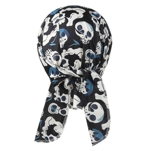Detail of black durag with skull print showing the silky fabric and tied back closure