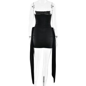 Detail view of the back of a black strapless mini dress with long flowing side streamers