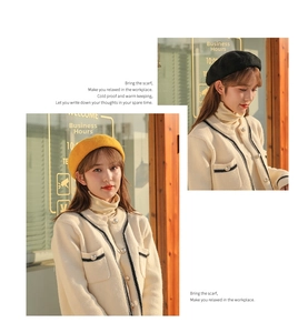 Detail view of yellow and black wool beret hats in elegant vintage minimalist style