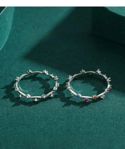 Detail of s925 silver wave bands with white zircon and multi-color rainbow gemstones