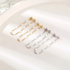Minimalist stainless steel tassel earrings with pearls and drops in gold and silver