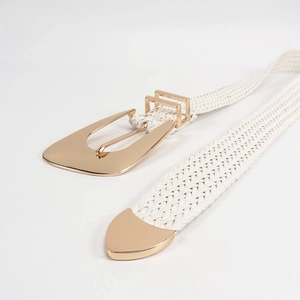 Detailed view of the woven white belt with decorative gold irregular metal buckle
