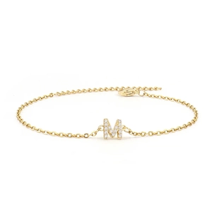 Detail of gold letter M pendant on necklace with lobster clasp and adjustable chain