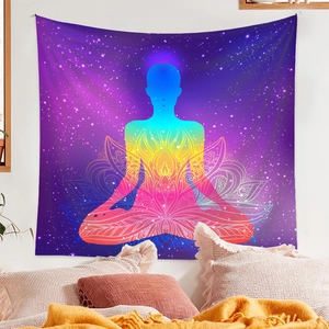Detailed view of bohemian meditation tapestry featuring a chakra silhouette and starry sky