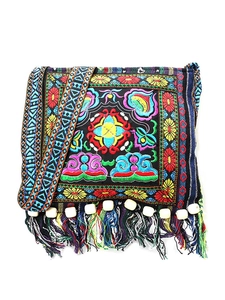 Ethnic bohemian crossbody bag with colorful floral embroidery and beaded tassels detail