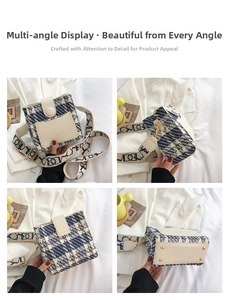 Detail view of plaid bucket bag with wide strap and metallic protective bottom studs