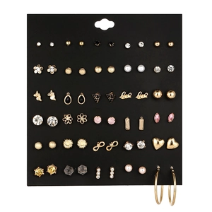 Detailed set of 30 pairs of gold and silver alloy earrings with rhinestones and pearls