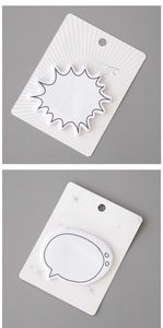 Detail of white sticky notes in speech bubble and star shapes on grey background