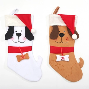 Christmas dog stockings in white and brown with bone charms and Santa hats for festive decor