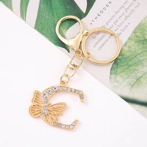Detail of crystal butterfly letter C keychain with gold alloy finish and lobster clasp