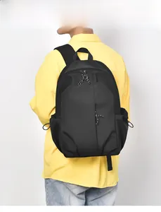 Detailed back view of a black high-capacity nylon backpack featuring striped zipper pulls