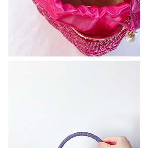 Detail of handmade beaded bucket bag featuring pink sequins, purple beads and pearl tassel