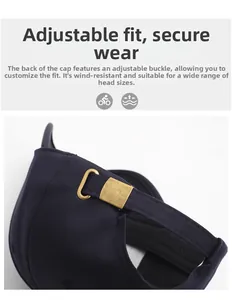 Detail of navy blue cotton baseball cap featuring an adjustable metal slider buckle