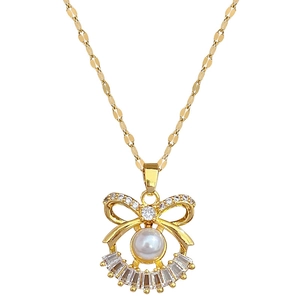 Titanium steel bow necklace with pearl and white zircon inlay on clean white background