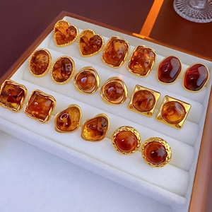 Vintage irregular geometric amber resin earrings set with gold-plated metal borders