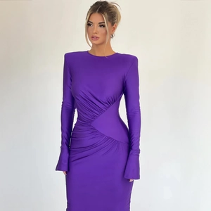 Detail view of the purple ruched dress with padded shoulders and slimming waist design