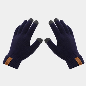 Detail of navy knit touch screen gloves with grey fingertips and leather logo patch