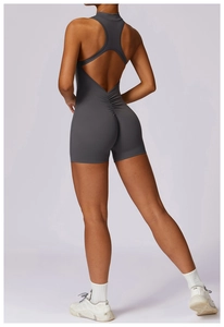 Detailed back view of dark grey yoga bodysuit with scrunch butt lifting and T-back design