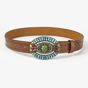 Detail of bohemian leather belt with turquoise buckle, pearls, and bronze metal flowers