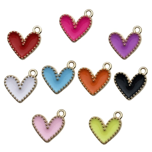 Set of colorful heart pendants in nine vibrant enamel colors with gold beaded edges