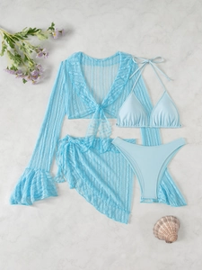Ensemble bikini quatre pièces bleu ciel avec cache-maillot en dentelle sur marbre
