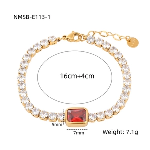 Gold stainless steel bracelet detail with red rectangular stone and clear zircon stones