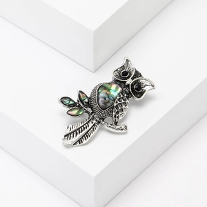 Fashionable owl brooch with natural abalone shell inlay and silver-tone metal finish
