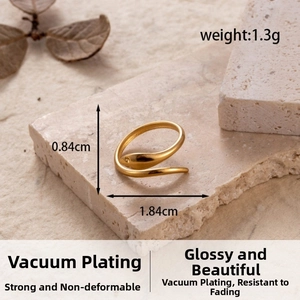Macro shot of 1.3g gold plated adjustable leaf ring on natural stone background