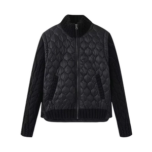 Men's black patchwork jacket featuring quilted nylon body and knitted ribbed sleeves