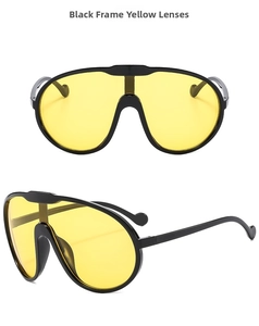 Detail of black oversized frame sunglasses with yellow one-piece lens for outdoor cycling