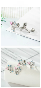 Macro view of butterfly zircon ear stud with pink heart gem and screw flat back
